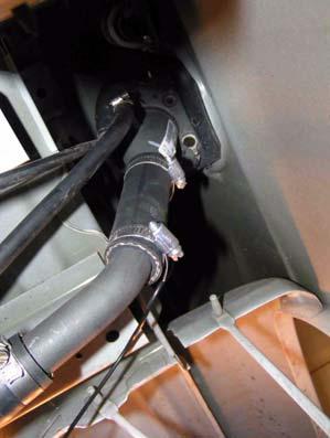 Adjust kit extension (fuel filler, rubber) and fuel filler hose.