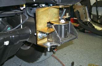 Trim driver and passenger front bumper brackets as shown.