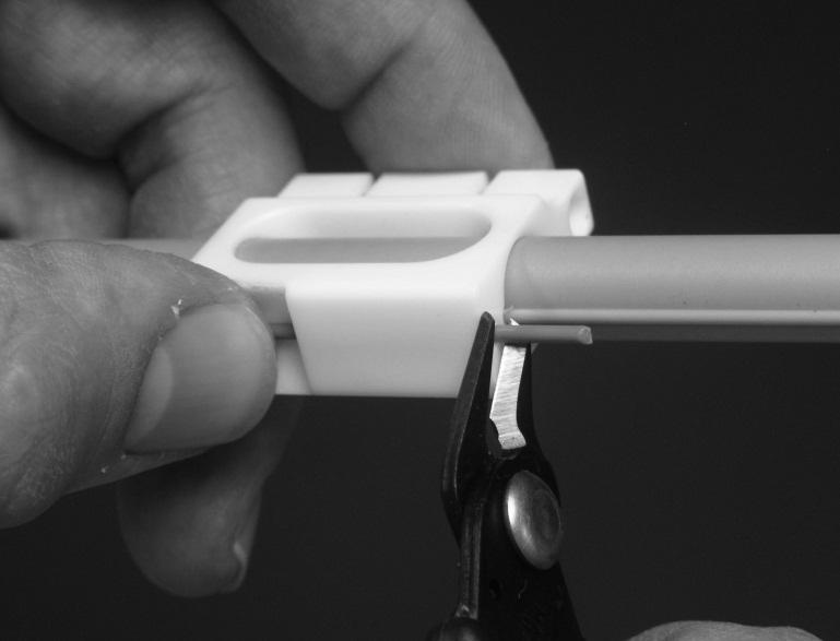 slider. Figure 7. Affixing the cable to the slider. Figure 8.
