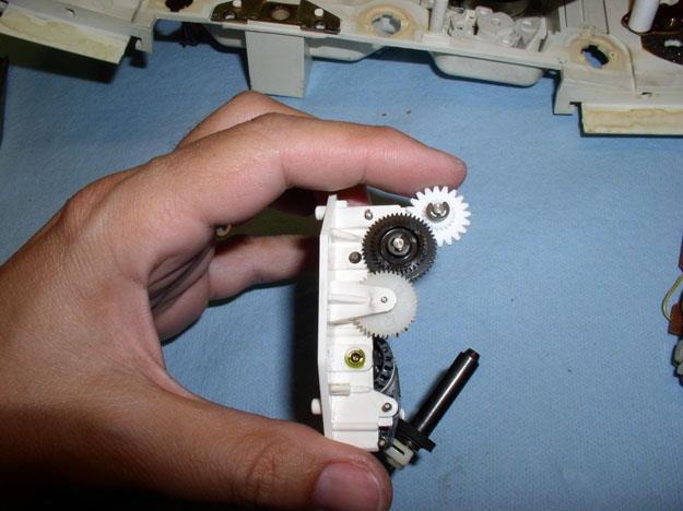 7. You ll also need to remove the drive motor s one screw and pull that out of
