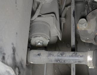 g) Line up the bolts shown with red circles in Figure 3e and Figure 3f. Hand thread in the bolts. Do not tighten until all four main bolts are installing.