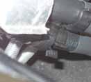 bracket between gearshift cable and hose A Fastening hoses A and