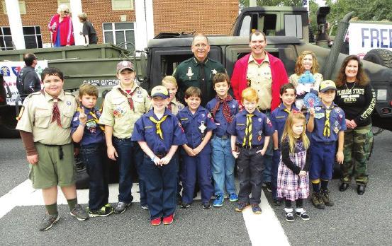 Accompanying the Humvee was Cub Scout Pack 79.