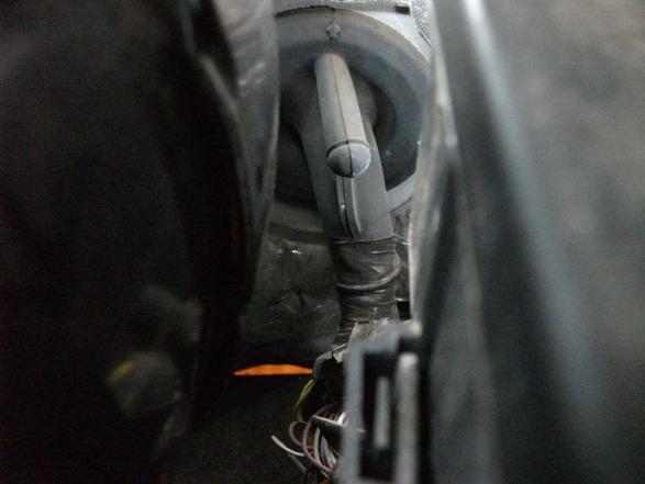 Install the black two pin power connector on the subwoofer power harness. Note: Make sure the blue retainer in the center of the connector body is not depressed.
