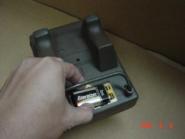 Insert one 9-Volt battery in the proper direction as indicated inside the