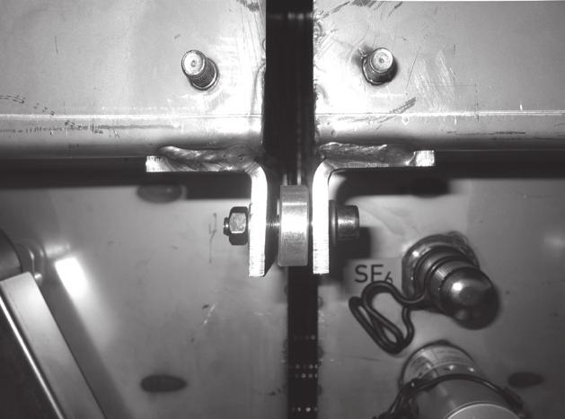 compartment), dished washers and nuts (figure 2.3.2.6). Initially, only lightly tighten the bolt connection.