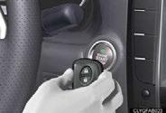remove the lock cover on the driver's door handle. The mechanical key is stored inside the electronic key.