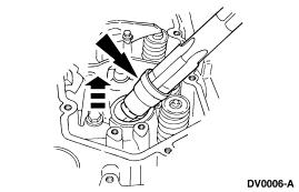 12. Remove sealant residue and all foreign material from the cylinder head fuel injector bore, using the injector sleeve brush. Installation 1.