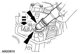 3. Clean the fuel injector sleeve and bore, using the fuel injector sleeve brush. Remove any sealant residue from the fuel injector bore. 4. Install new O-rings on the fuel injector.