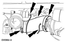 7. Disconnect the exhaust outlet pipe. 1. Loosen the Marmon clamp. 2. Disconnect the exhaust outlet pipe. Vehicle with exhaust back pressure system 8. Disconnect the exhaust back pressure valve. 1. Slide the retaining clip away from the exhaust back pressure valve actuator lever.