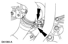 25. Using the Fuel Line Tool, disconnect the fuel lines. 26. NOTE: Step 26 applies only to vehicles equipped with automatic transmissions.