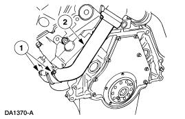 12. Remove the exhaust adapter pipes. 1. Remove the four mounting bolts and nuts. 2. Remove the exhaust adapter pipes. 13.