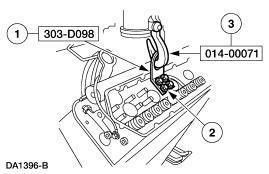 43. Remove the cylinder heads. 1. Position the special tool. 2. Install the four bolts. 3. Attach the special tool and remove the cylinder head. 44. Remove the oil cooler. 1. Remove the bolts. 2. Remove the oil cooler and the gaskets.