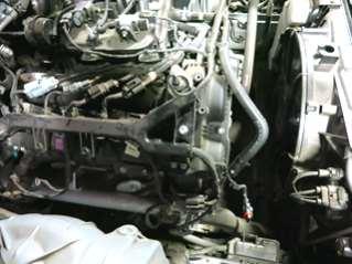 k. Remove the bolt circled on the passenger side valve cover.