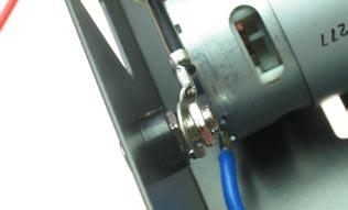 the negative (black) terminal of the wiring loom to the black charge post: and tighten securely as