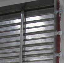 Cost Saving Products Tight Space Constraints Use Firestop Where standard retaining angle installations will not work, Greenheck has a UL approved