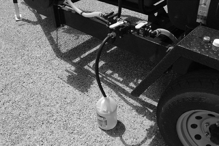 Plug > Figure C3 Draining the Tank The pressure washer must have an anti-freeze solution circulated throughout the washer by one of two options. RV anti-freeze is a recommended solution.