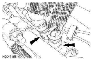 For additional information, refer to Section 303-14. All vehicles 10. Connect the coolant hose to the intake manifold. 11.