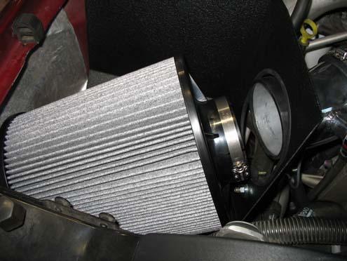 i) Install the previously removed air filter restriction gauge into the grommet installed in