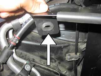 j. Install the heat shield in the vehicle by aligning the two