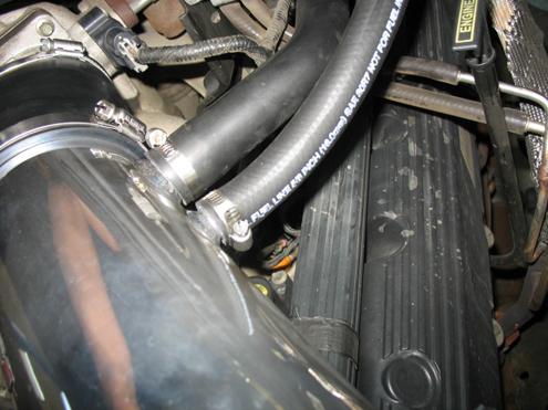 intake pipe and loosely secure with the #64 hose clamp.
