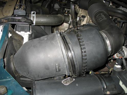 e. g) Remove the upper intake pipe from the