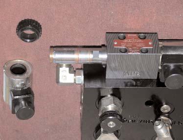 Install the straight adapter fittings (B) in the A and B ports. (Figure 1a.) D C Figure 1a. Prepared Automated Steering Block.