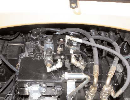 Connect the pressure and tank hoses (O) between the pressure and tank ports on the tractor and the respective P and T ports on the Automated Steering