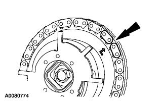 crankshaft sprocket with the single copper (marked) link on the chain. 13.