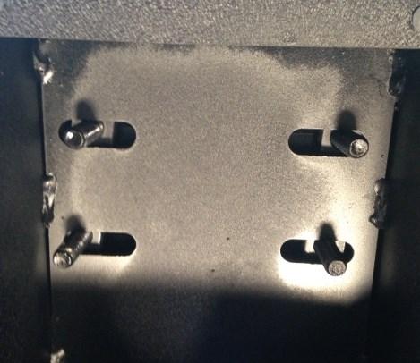 2) Locate the mounting plates and studs