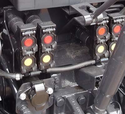 A C B IN-CAB HYDRAULIC CONTROLS Controls for the rear 3-point hitch and remote valves are located in the right hand console for easy reach and operation.
