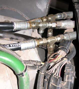 5. Install Hydraulic Hoses: Connect the left and right steering hoses (K and L) between the A and B ports of the hydraulic control block and the run-tees installed in