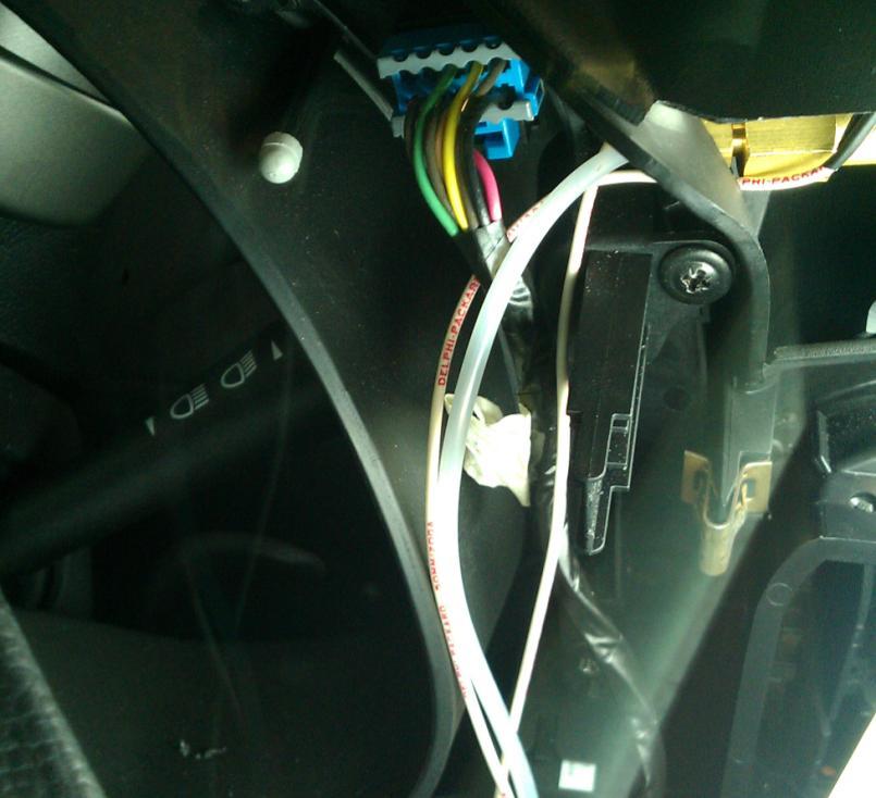 Figure 15: Power wires and vacuum line routing 19. Reinstall the gauge cluster trim. The installed gauge should look like figure 16.