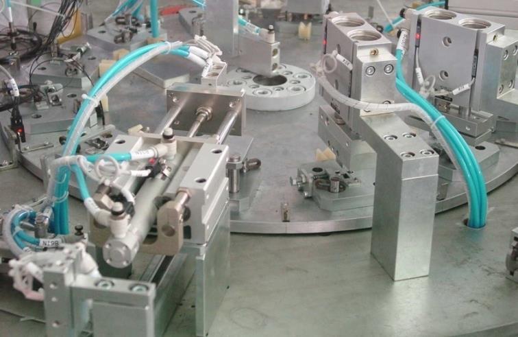 automative assembly line and the robot arm.