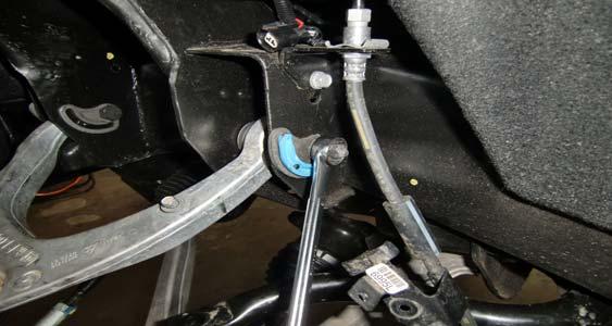 Install the appropriate side ReadyLIFT upper control arms into the frame using the