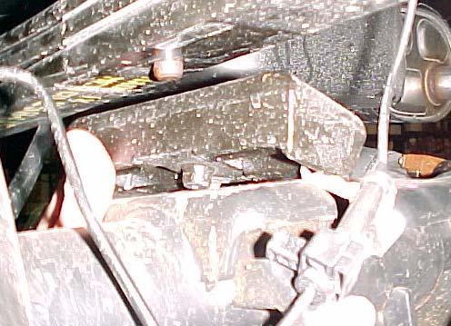 30. LOOSEN AND REMOVE THE STOCK U-BOLTS AND DISCARD. 31. REMOVE THE FACTORY LOWER SPRING PLATE. 32. LOWER THE AXLE FAR ENOUGH TO ALLOW STOCK BLOCK TO BE REMOVED. THE FACTORY BLOCK BEING REMOVED. 33.