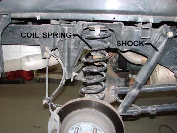 The shocks can be completely removed for clearance during installation, but it is not required.