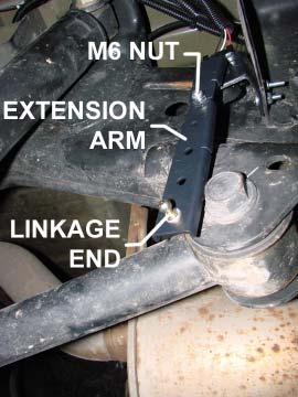 OPTION 2: While holding the bracket in place, use the self-tapping screws to attach the height sensor bracket to the vehicle. The height sensors are marked L and R for left and right.