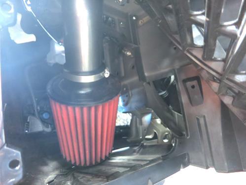 Install the AEM air filter onto the lower end of the intake tube and secure with the supplied hose clamp (9444).