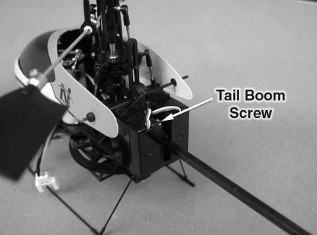 Carefully align the tail rotor blade to this fl at spot and slide the tail rotor onto the shaft. Install the tail rotor retainer.