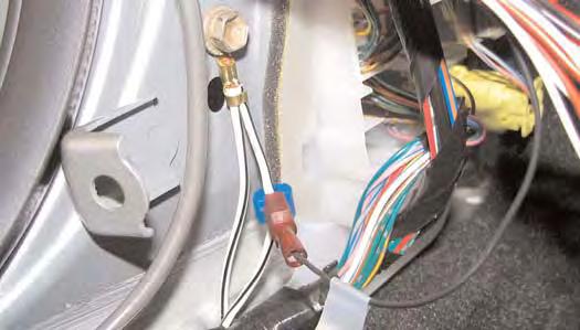 USE THE SUPPLIED RED T-TAP TO CONNECT THE RED IGNITION WIRE OF THE MIRROR POWER HARNESS TO PIN 3 OF WHITE CONNECTOR IA2.