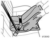 CAUTION Push and pull the child restraint system in different directions to be sure it is secure.