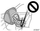 Move seat fully back CAUTION Never put a rear facing child restraint system on the front passenger seat because the force of the rapid inflation of the front passenger airbag can cause death or