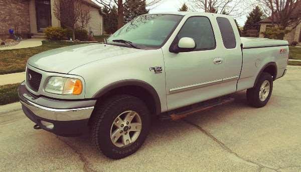 2002 Ford F-150, 4WD, one owner with 61,000 miles, new tires, runs good, serviced by