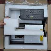 Make sure to begin the unboxing by laying the outer printer box on a dry, clean,