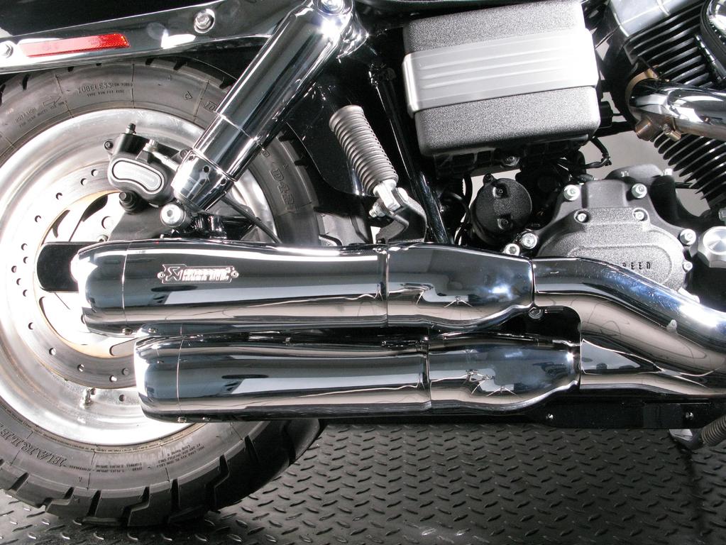7. Install the assembled mufflers back onto the motorcycle; check the Slip-On exhaust system installation manual for
