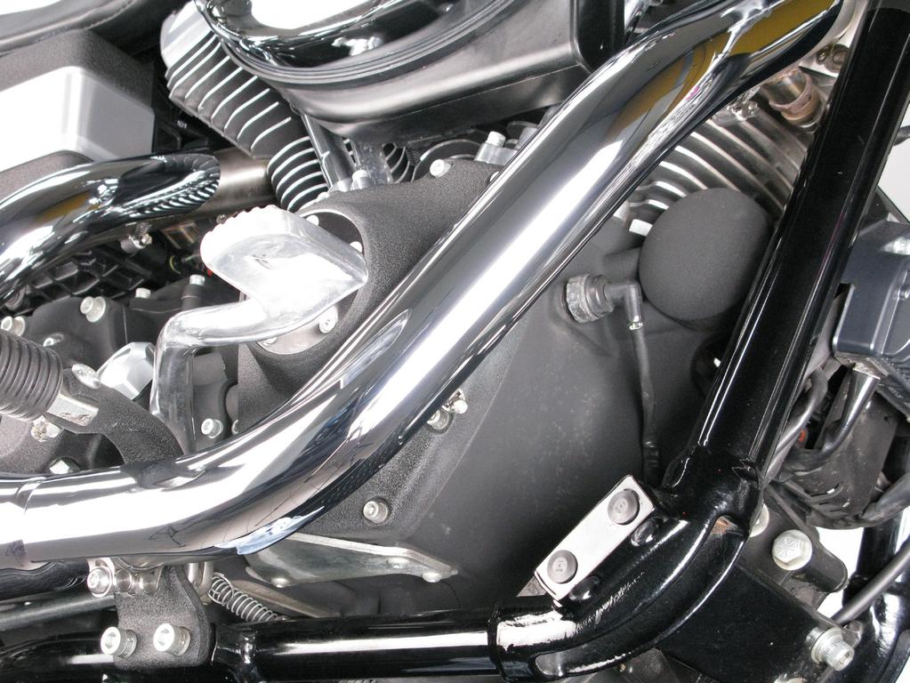 9. Correctly attach both heat shields onto the headers, align them in respect to the pipes, mufflers and tighten the tape