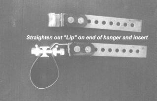 The following photos show how to handle attaching most any hanger or bracket to a Band Type Clamp. HEADER ANGLED WRONG?