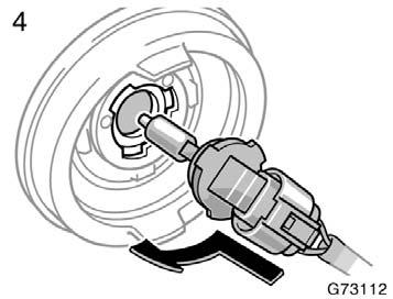 3. Pull the bulb out of the bulb base and install a new bulb. If the connector is tight, wiggle it. 4. Insert the bulb base into the mounting hole by turning it clockwise.