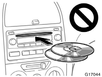 YOUR COMPACT DISC PLAYER WITH CHANGER (type 2 and 3) When you insert a disc, push the LOAD button and gently push the disc in with the label side up.